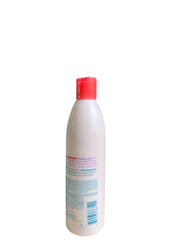Back view of the Just for Me Natural Hair Milk oil moisturizing lotion bottle, highlighting the red cap and product details on the back.