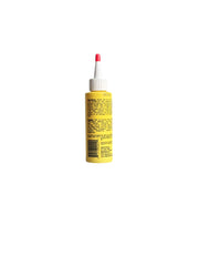 Back view of Wild Growth-Light Oil Moisturizer bottle showing the yellow packaging and detailed instructions and ingredients listed on the label.