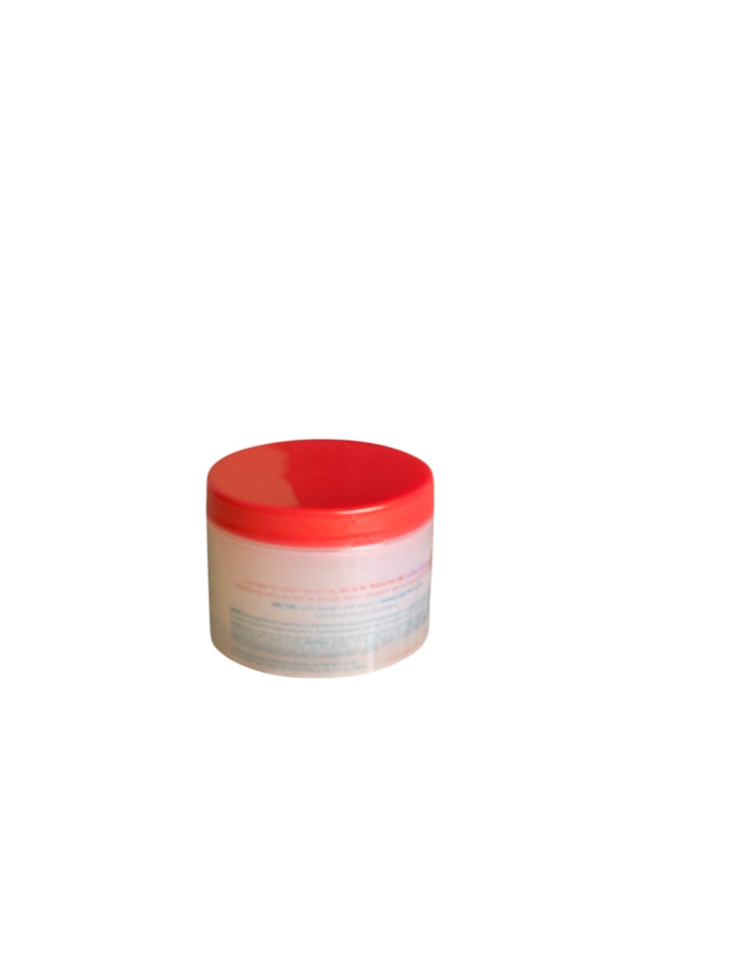 Back view of the Just For Me Soothing Scalp Balm jar, showcasing its informative packaging and vibrant red lid.